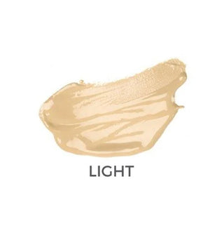A swatch of light beige liquid foundation or concealer on a white background with the word 'LIGHT' printed below.